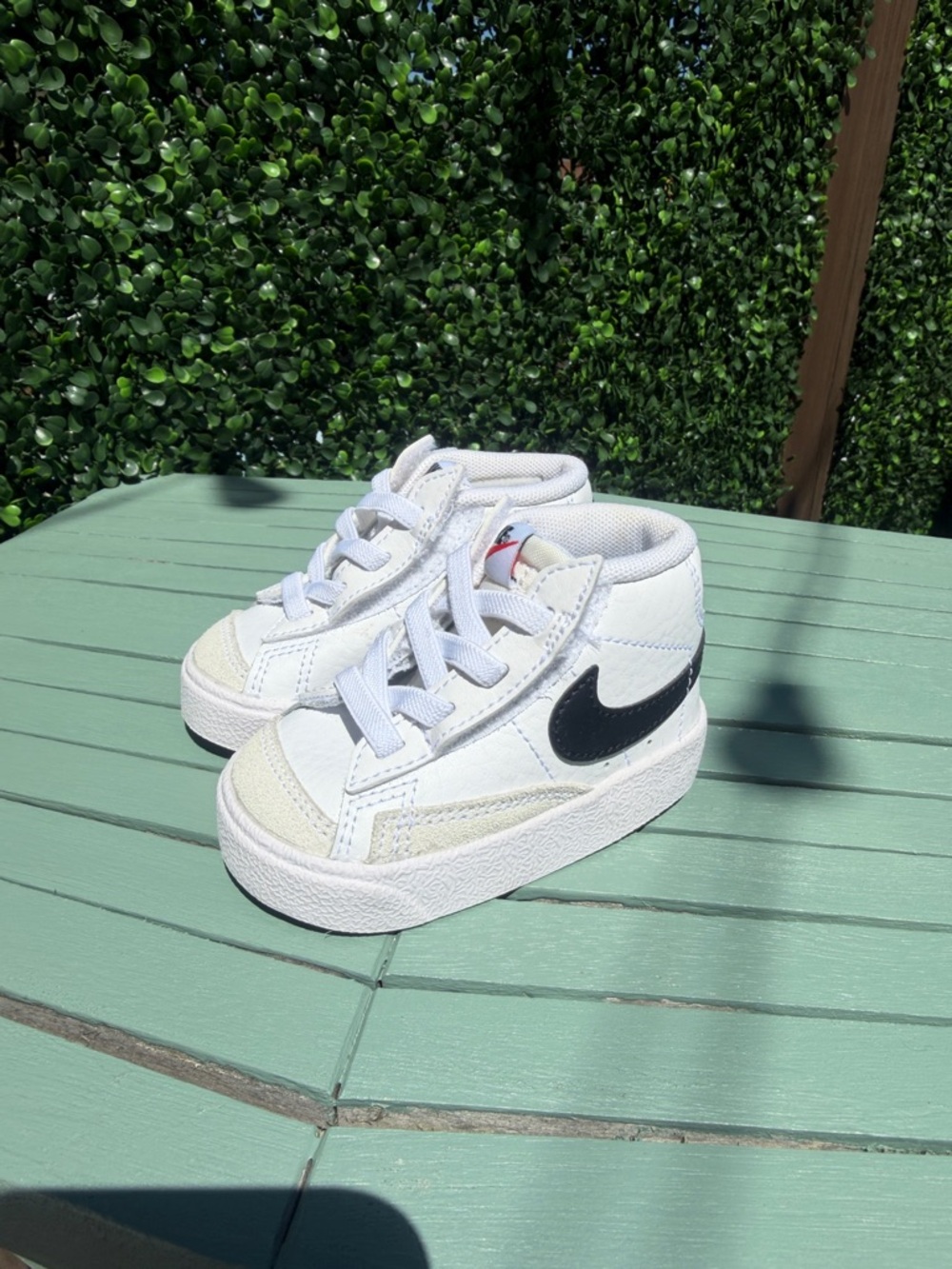Nike Kids White Sneakers with Black Swoosh - High-Top Casual